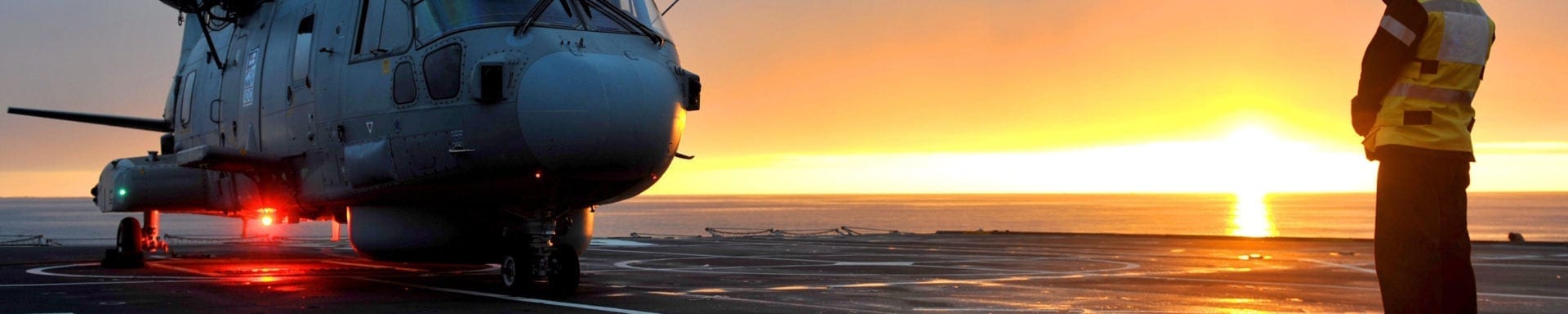Royal Navy Merlin Helicopter Prepares to Takeoff from RFA Argus